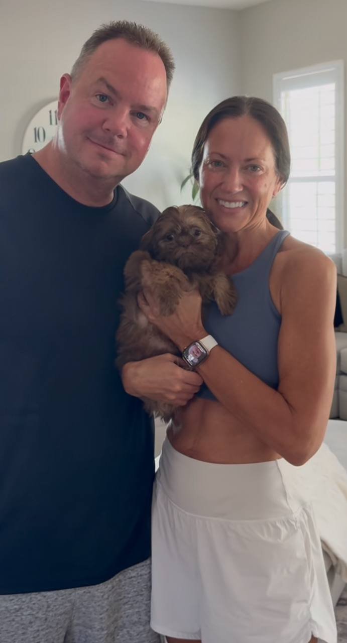 Marcus Bell with their Shih Tzu puppy from Royal Puff Paw Shihtzu