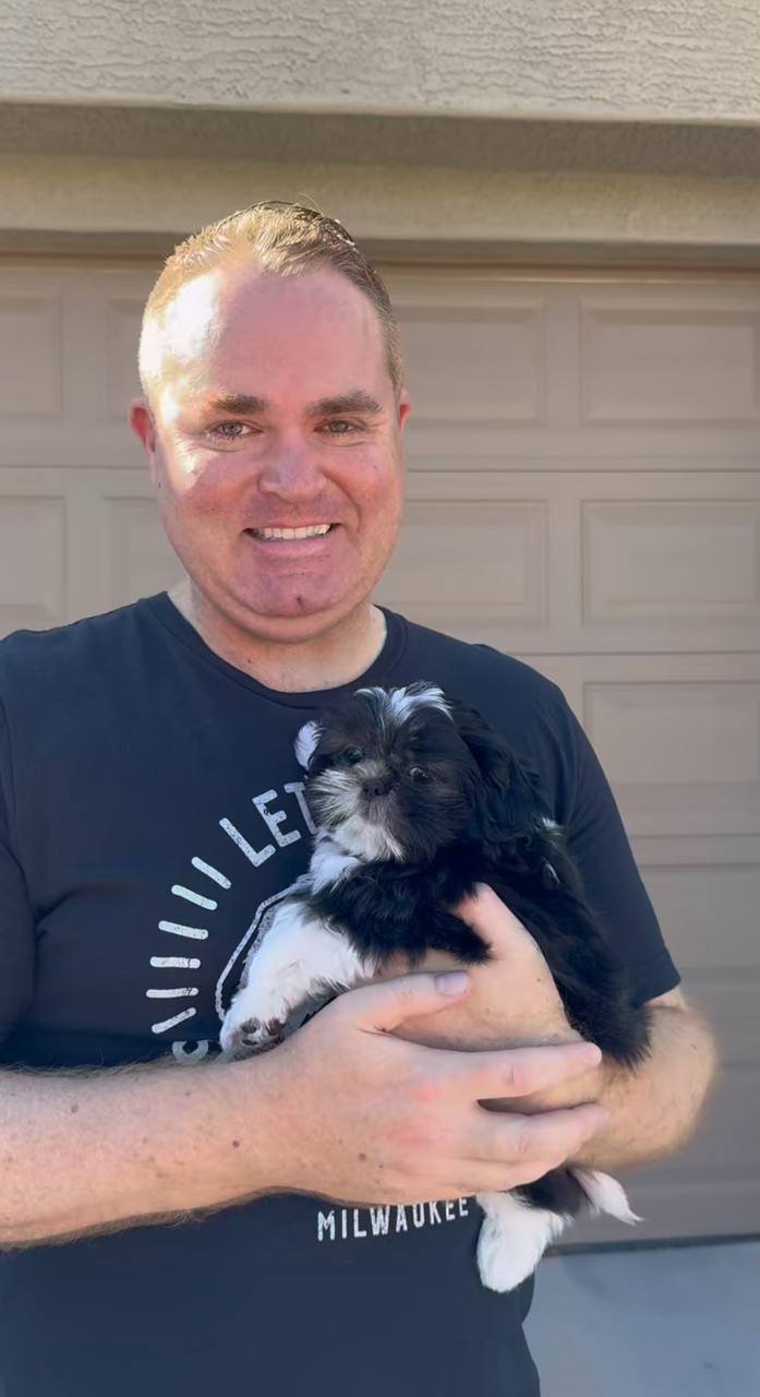 Anita Delacroix with their Shih Tzu puppy from Royal Puff Paw Shihtzu