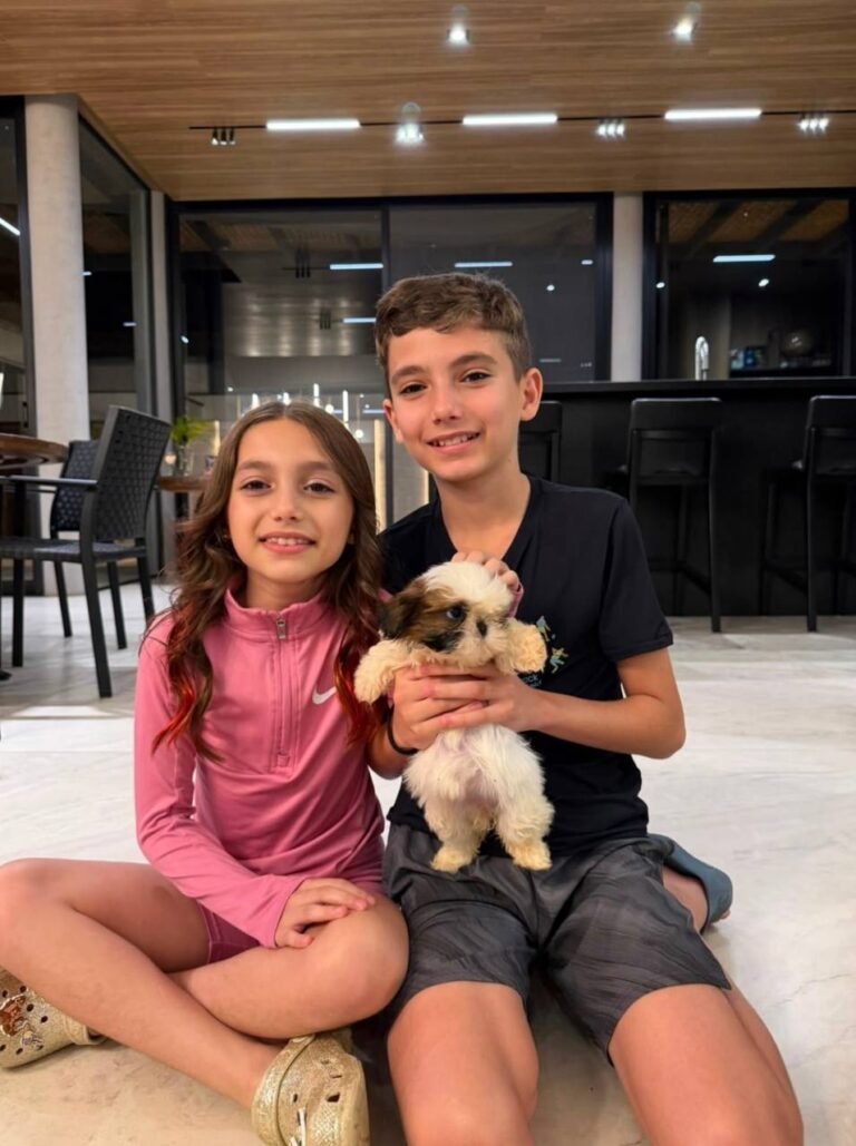 Meredith Sloane with their Shih Tzu puppy from Royal Puff Paw Shihtzu