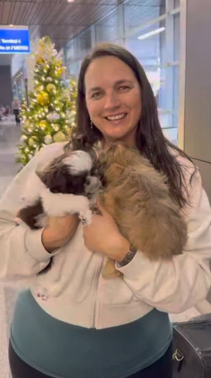 Grace Whitcomb with their Shih Tzu puppy from Royal Puff Paw Shihtzu